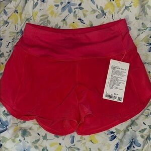 Lululemon Athletica Red Athletic Shorts with Curved Hem